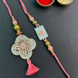 Elegant Bhaiya-Bhabhi Rakhi & Lumba Set with Rose Design & Tassels